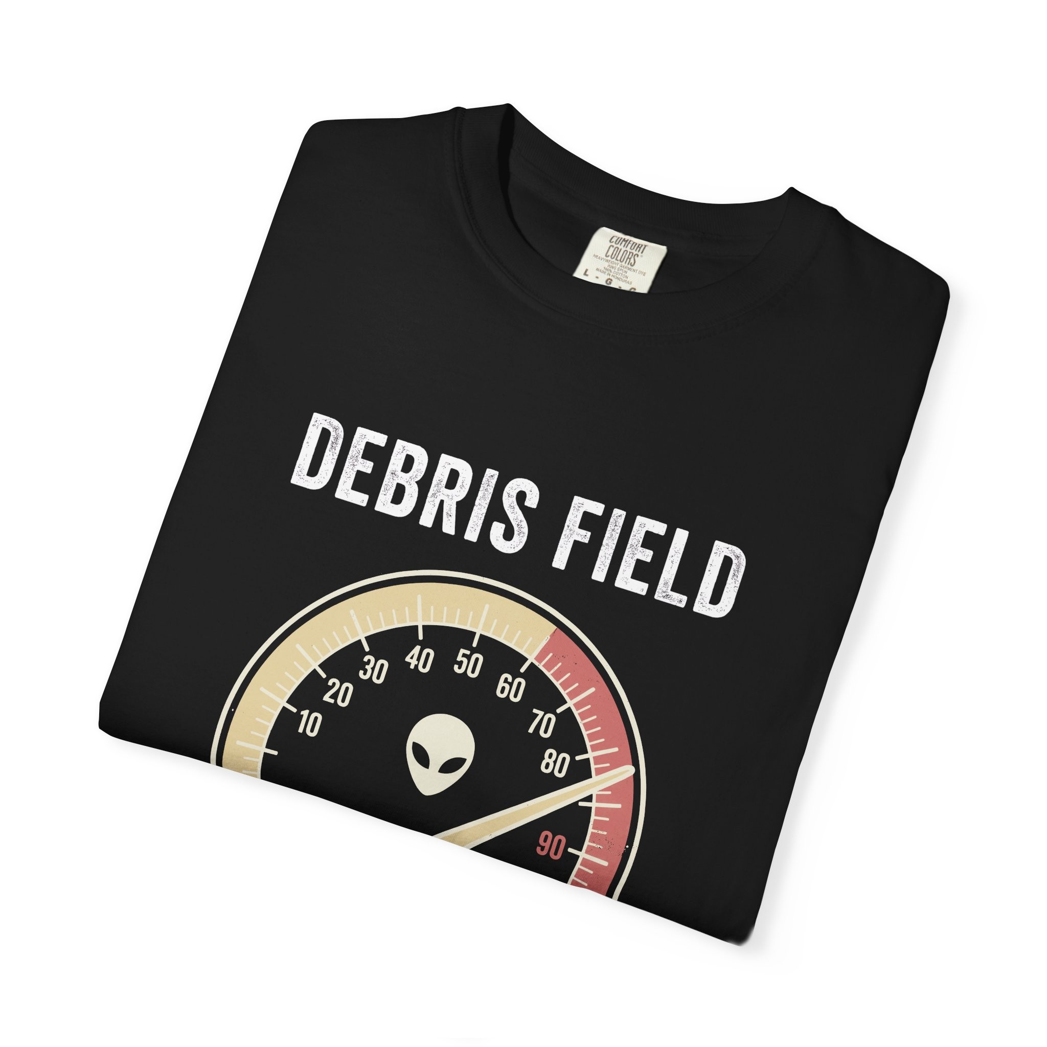 Close-up of the Debris Field print on a folded black tee