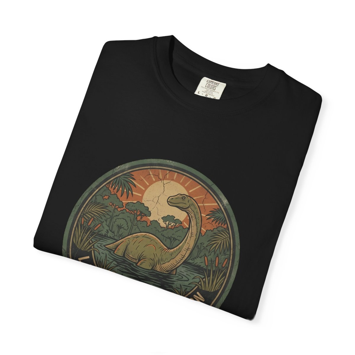 Close-up of the Lake Télé Field Station print on a folded black tee