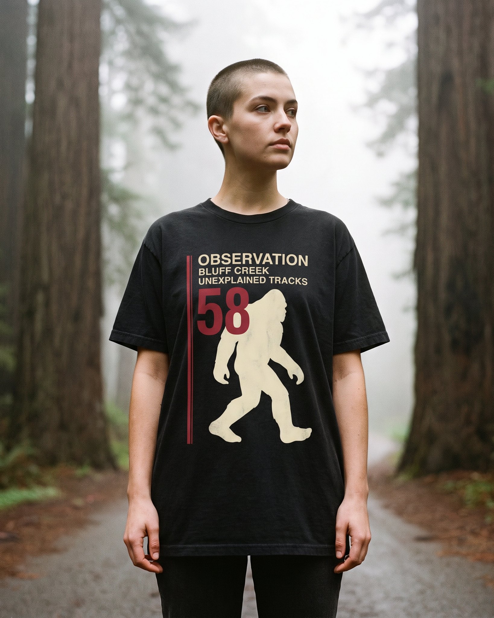 A person wearing the Observation 58 tee in black on location near Bluff Creek, California