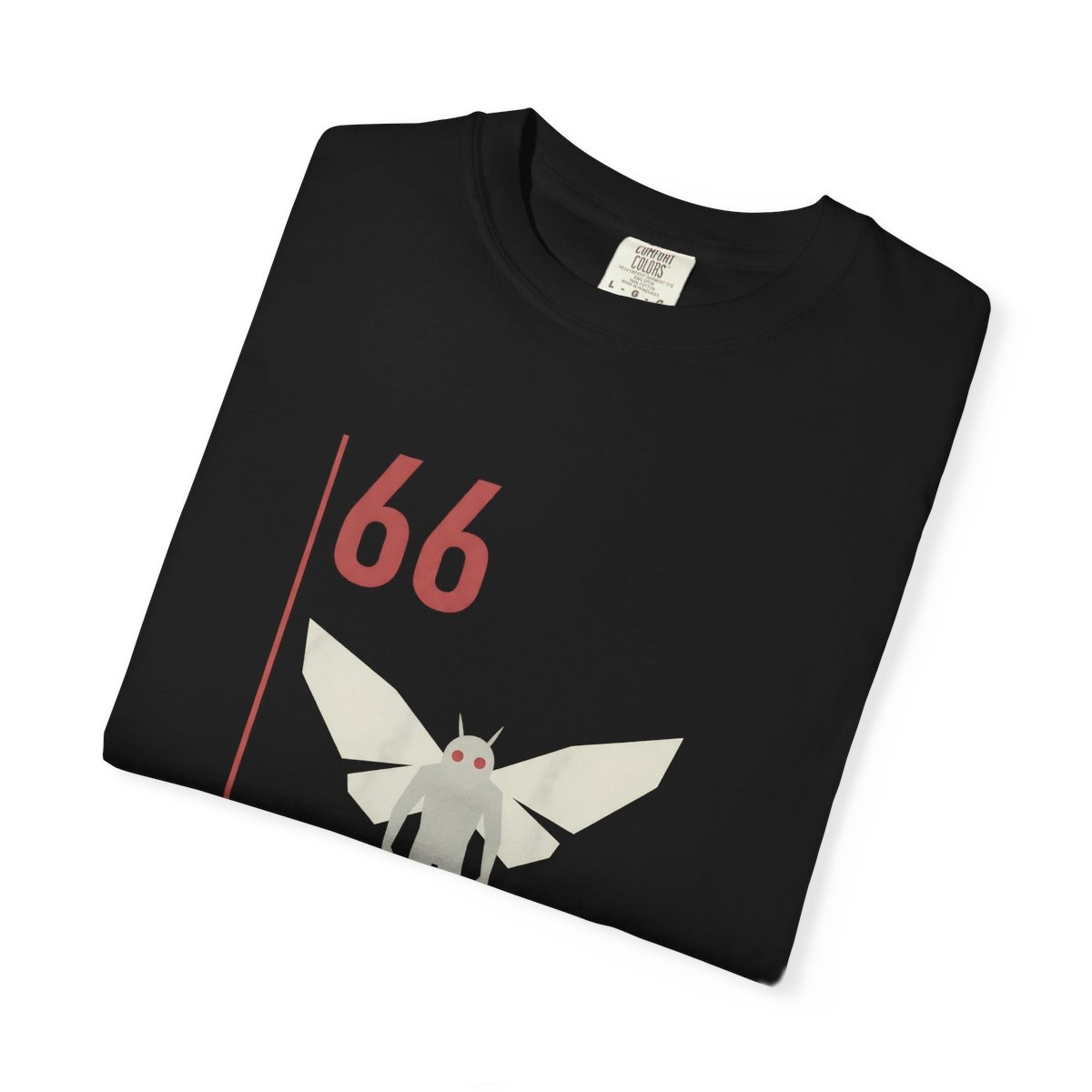 Close-up of the Observation 66 print on a folded black tee