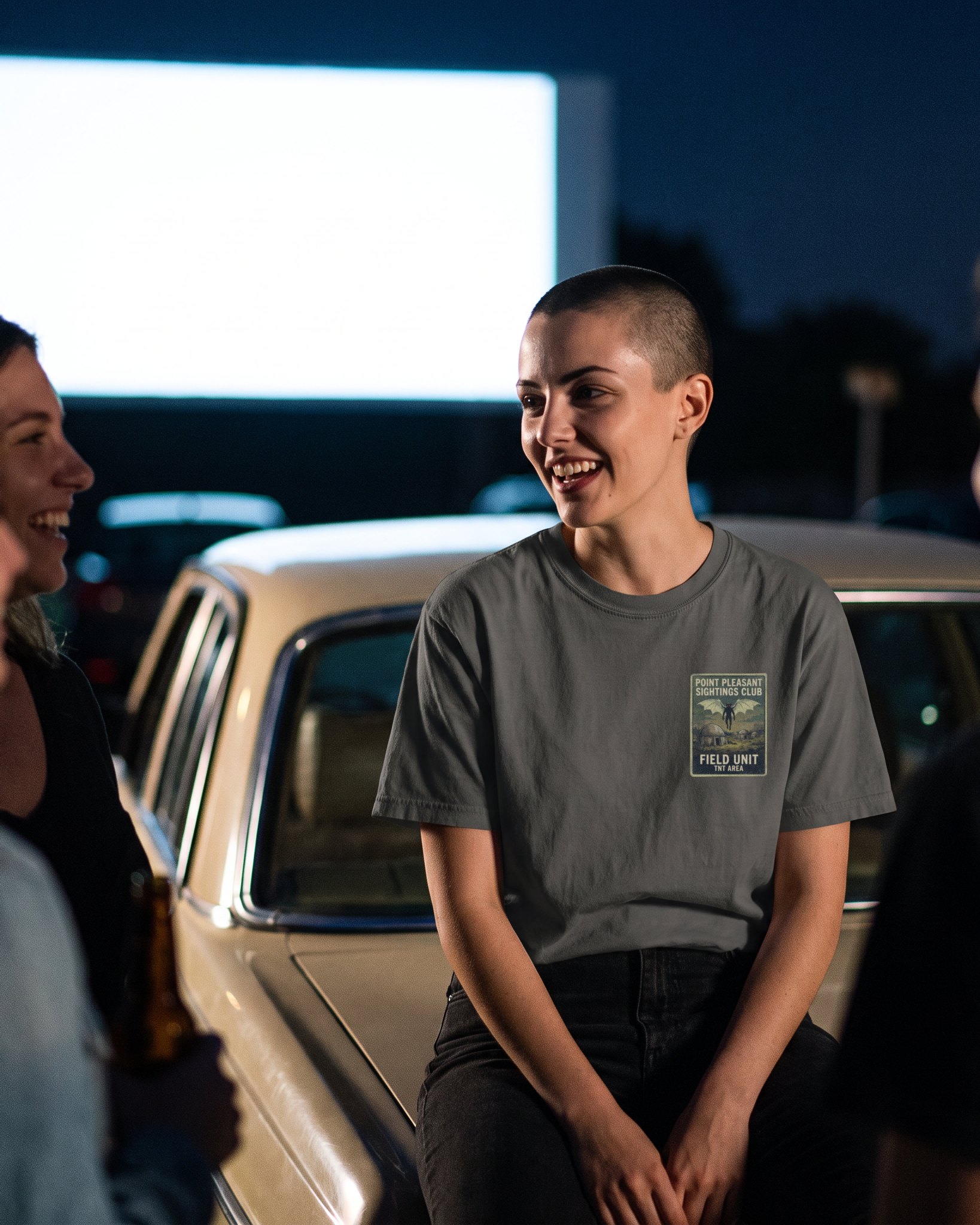 The same person wearing the Point Pleasant Sightings Club tee in pepper