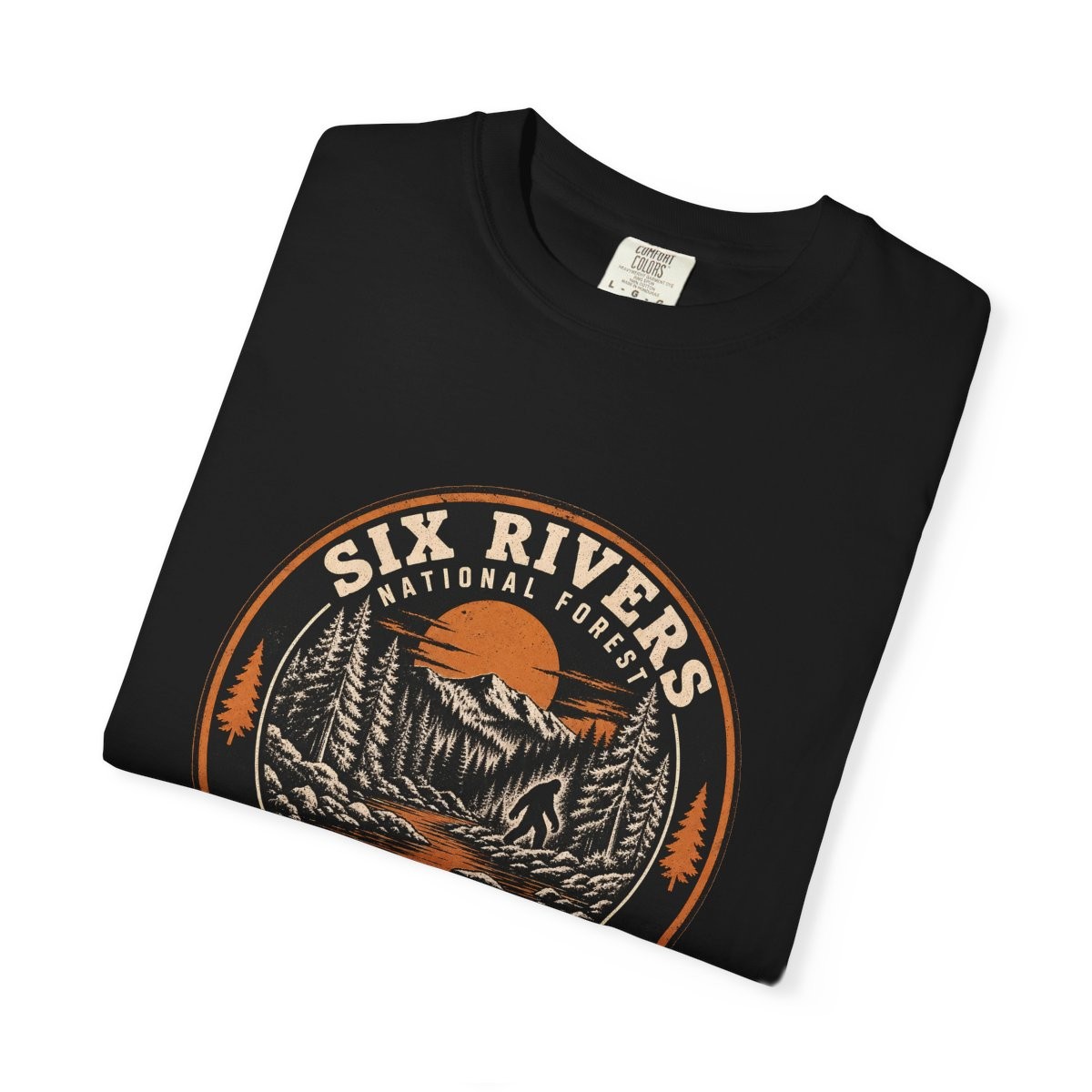 Close-up of the Six Rivers Field Station print on a folded black tee