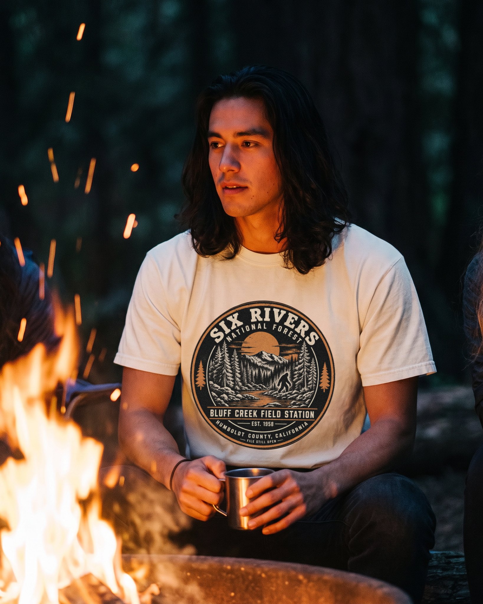 The same person wearing the Six Rivers Field Station tee in ivory